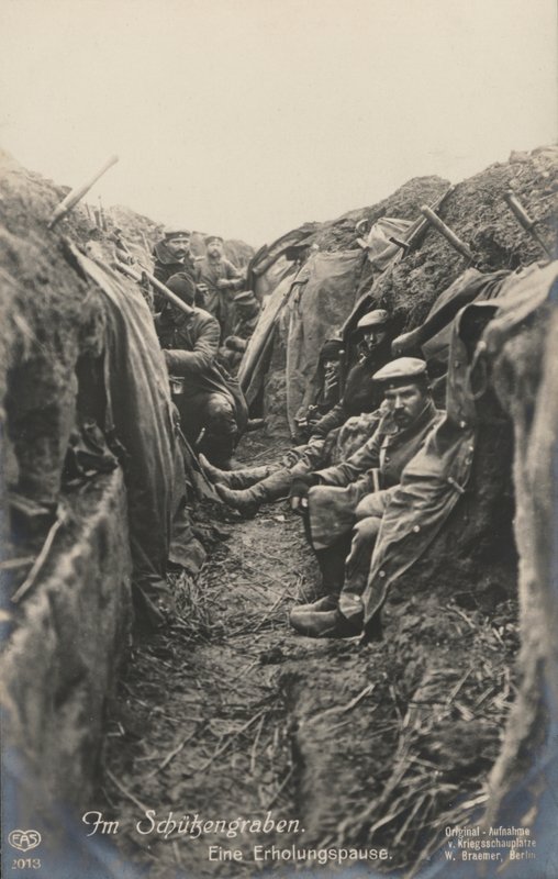 German soldiers taking a break in the trenches, World War I by Photographer German