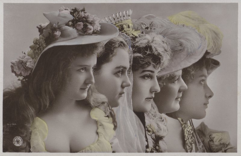Line of women in historical dress by Photographer German