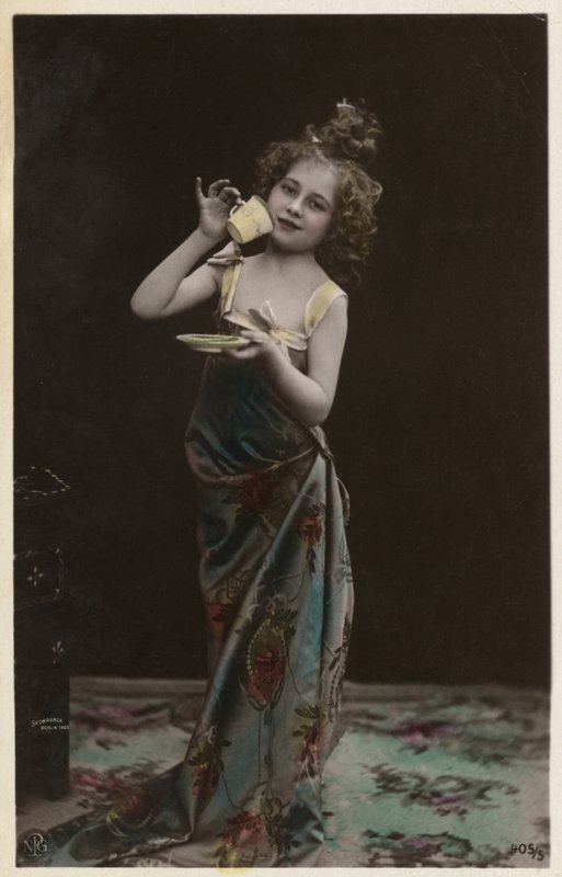 Little girl dressed up drinking tea by Photographer German