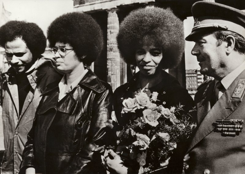 Angela Davis welcomed by soldiers of the National People