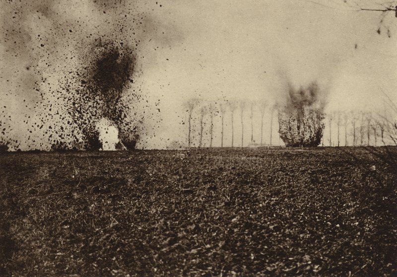Shells exploding in front of St Vaast Wood, near Arras, France, World War I by Photographer German