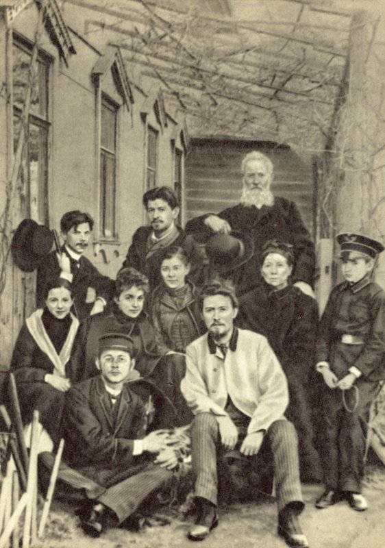 Anton Chekhov with Relatives and Friends in the Courtyard of His House on Sadovaya-Kudrinskaya Street, Moscow, Spring 1890 by Russian Photographer