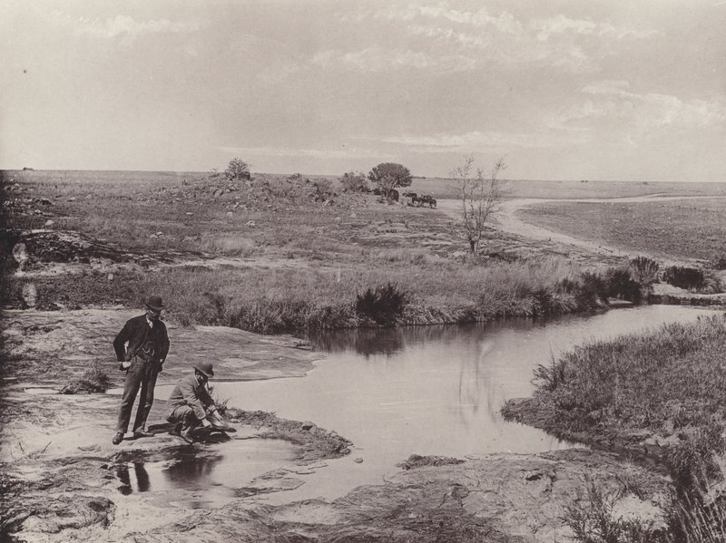 Panning Ore to Discover Gold (b/w photo) by South African Photographer
