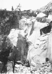 Excavators at work at a marble quarry in the Apuan Alps, Tuscany