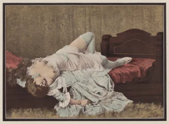 Woman lying on a bed
