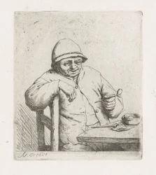 Man with a pipe at a table