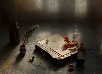 Quill Pen and Old Papers
