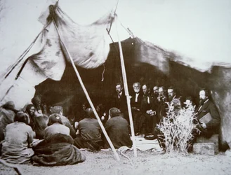 General William T. Sherman presides at the Treaty of Fort Laramie with Chief Red Cloud, April 1868