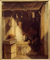 Turkish merchant smoking in his shop