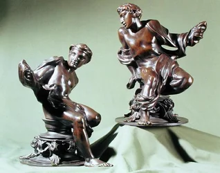 A pair of classical male nudes, designed as fender finials, manufactured by Henry E. Hoole & Co.