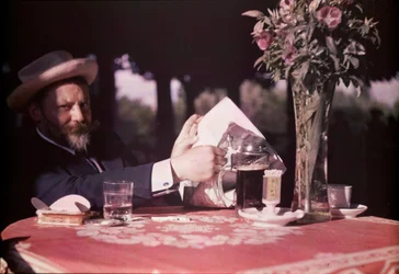 Frank Eugene Seated at Table, 1907