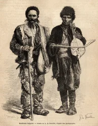 Bulgarian itinerant beggars, including a blind person playing ghuzla (Serbian lute has a rope) that accompanies the recitation of poetry and epic recits, engraved after the drawing of A. De Neuville, illustrating the journey to Bulgaria