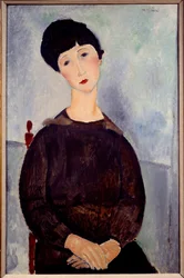 Portrait of a Sitting Brown Girl