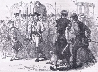 A countryman tarred and feathered