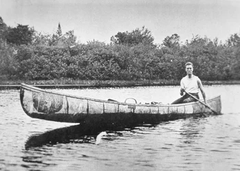 Franklin D. Roosevelt paddling a birch canoe at Campobello Island, New Brunswick