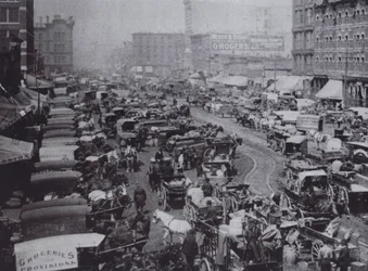 Haymarket Square packed with horse-drawn carriages, Chicago