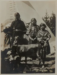 Woman, Two Girls and a Child with Dog, ca. 1900
