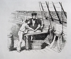 American whalers cutting whale blubber into 