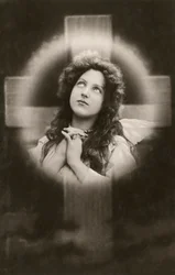 Devout Woman Praying Before a Cross