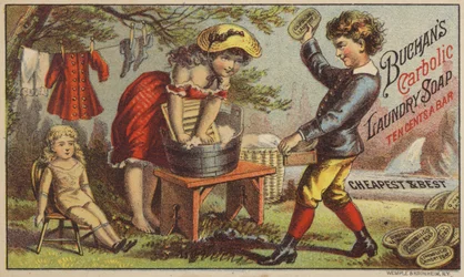 Girl Washing Dolls Clothes