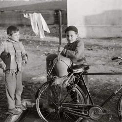 Child Water Carrier on Bicycle