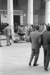 Masked on a Vespa
