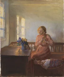 A Young Girl Plaiting her Hair
