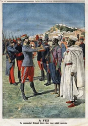 Commander Edouard Bremond (1868-1948) decorates two old Moroccan soldiers in Fez. Engraving in Le Petite Journal, on 21/01/1912. Private collection