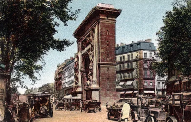 Paris: View of the Boulevard Saint Denis and the Porte Saint Denis (Saint-Denis) Built by Francois Blondel (1618-1686) in 1672. Photograph of 1920 in 