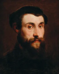 Portrait of a young man wearing a hat