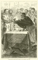 Bonner held his hand over the flame of a wax candle
