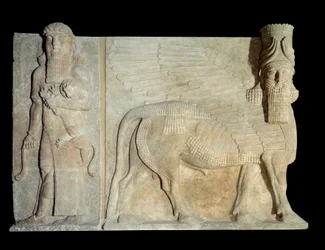 Courtyard of the palace of King Sargon II of Assyria: androcephal bull wing with hero mastering a lion