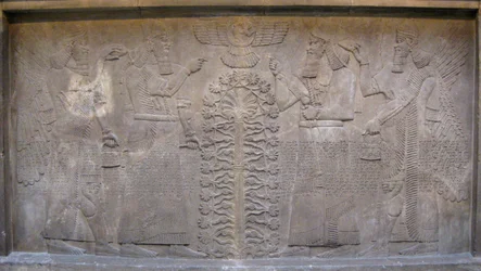 Relief with Two Figures of Ashurnasirpal, Winged Mythological Beings and the God Ashur, Before the Tree of Life, 885-860 BC