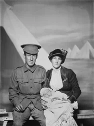 Studio Portrait of 1159 Private George Beamish Swanton, Australian 24th Battalion, of Werribee, Victoria, with His Wife Nellie and Young Baby, Joan Helen, c. May 1915