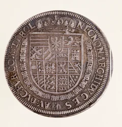 Silver coin (thaler) from Tyrol: reign of Emperor Rudolf II (Rodolphe II) (1552-1612). Diameter 4 cm, Naples, National Archaeological Museum
