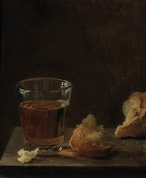 A Glass of Beer and a Bread Roll on a Table