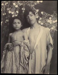 Sicilian Boy and Girl Before Floral Textile