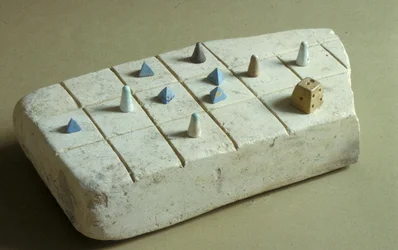 Game board with playing pieces, from Tell Beit Mirsim, Jordan, c.1200 BC