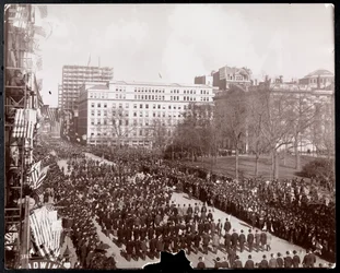 Aerial view of men marching in the Republican Gold Standard Parade on Broadway at City Hall Park, New York