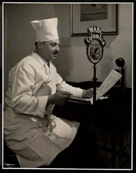 Portrait of Chef Maurice Hervieux at the Microphone at the Hotel Commodore
