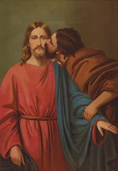 Judas betraying with a kiss
