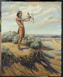 Indian boy with buffalo skull