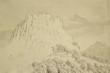 Rocky Hilltop with a Wooded Hill in Front