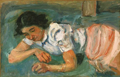 Young Woman Lying on the Grass