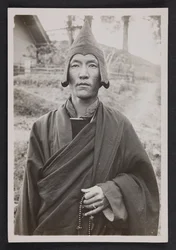 A Nyingma Monk Holding a Rosary
