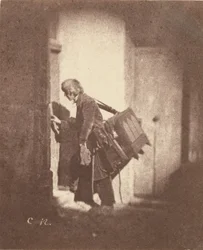 Organ Grinder at 21, quai Bourbon, Ile Saint-Louis, Paris