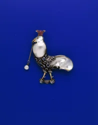 A Guild of Handicraft white and yellow metal brooch in the form of a 