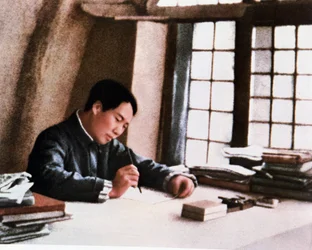 Mao writing his work From Prolonged War in a cave in Yenan