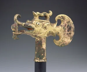 Axe head in the form of a dragon fish, Tang dynasty