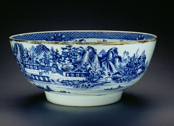 Blue and white bowl decorated with a scene showing the manufacture of porcelain